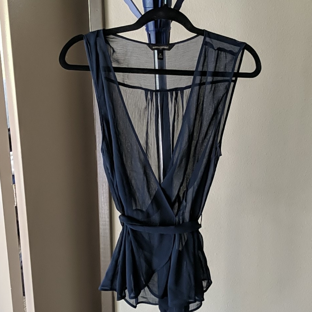 Sheer blue sleeveless blouse, M